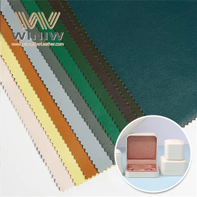 လက်ဝတ်ရတနာအကွက်များအတွက်အစွန်းအထင်းခံနိုင်ရည်ရှိသောသက်သတ်လွတ် Pu သားရေထည်